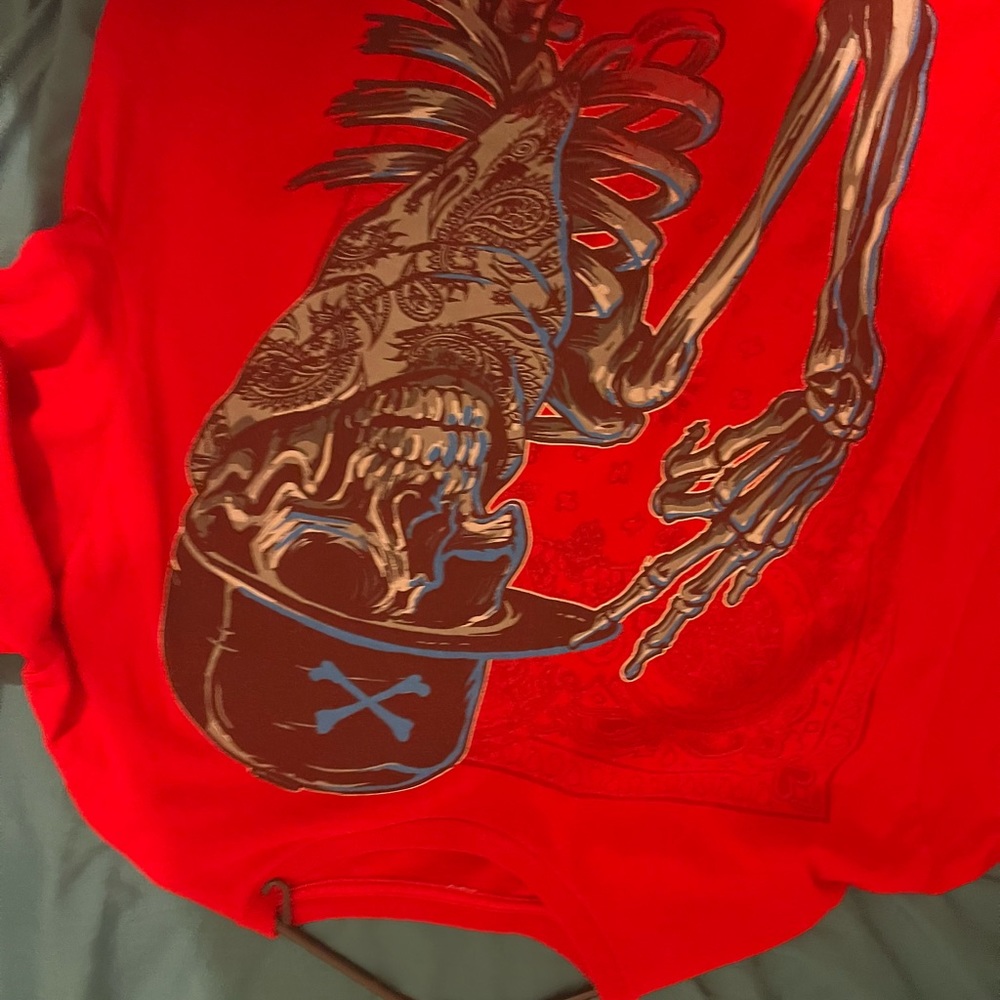 It’s a red shirt with a skull on it
